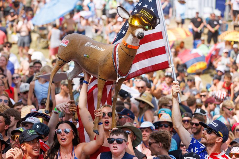 A deer target known as "Evan the Deer" is held up in the podium area after the 450 Moto 2 at the RedBud Pro National MX event on Saturday, July 5, 2025, at the RedBud MX track in Buchanan, MI.