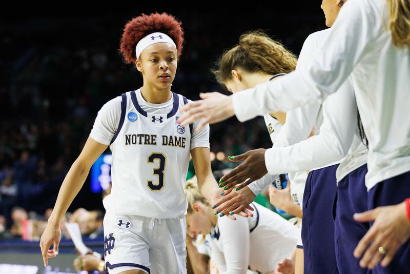 Notre Dame guard Hannah Hidalgo (3) is checked out of the second round of the NCAA Women's Basketball Tournament between Notre Dame and Michigan at Purcell Pavilion on Sunday, March 23, 2025, in South Bend.