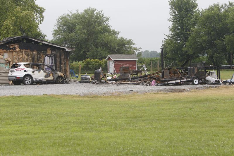 Joshua Hancock's garage in the 13000 block of South U.S. 231 went up in flames late Friday, July 4, 2025, after buckets of fireworks inside the garage was accidentally ignited, according to Indiana Fire Marshal Office investigator. A woman in the back of the garage was unable to escape and died, according to investigators.