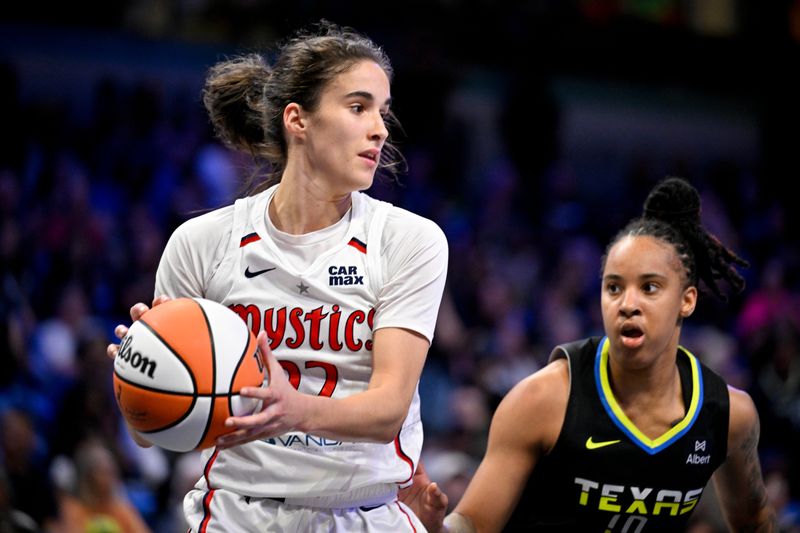 Jun 28, 2025; Arlington, Texas, USA; Washington Mystics guard Sonia Citron (22) grabs a rebound against the Dallas Wings during the second half at College Park Center. Mandatory Credit: Jerome Miron-Imagn Images