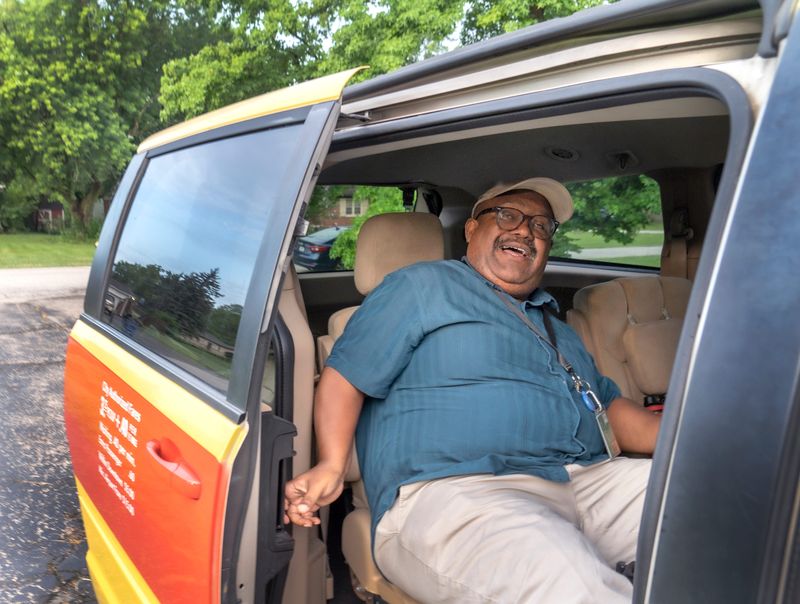 Ryan Malone gets into a taxi as part of IndyGo’s paratransit services Monday, July 7, 2025. He uses the service to go to work and to return home. The service provides public transportation for people with disabilities who are not able to use the regular transportation system offered by IndyGo. Malone has had visual impairments his whole life. He also has optic neuritis which is a part of his multiple sclerosis. Because of the MS he needs a safe, steady and predictable environment not to exacerbate his symptoms. A fare increase of 57% is proposed for next year, raising the fare from $3.50 to 5.50 a ride.