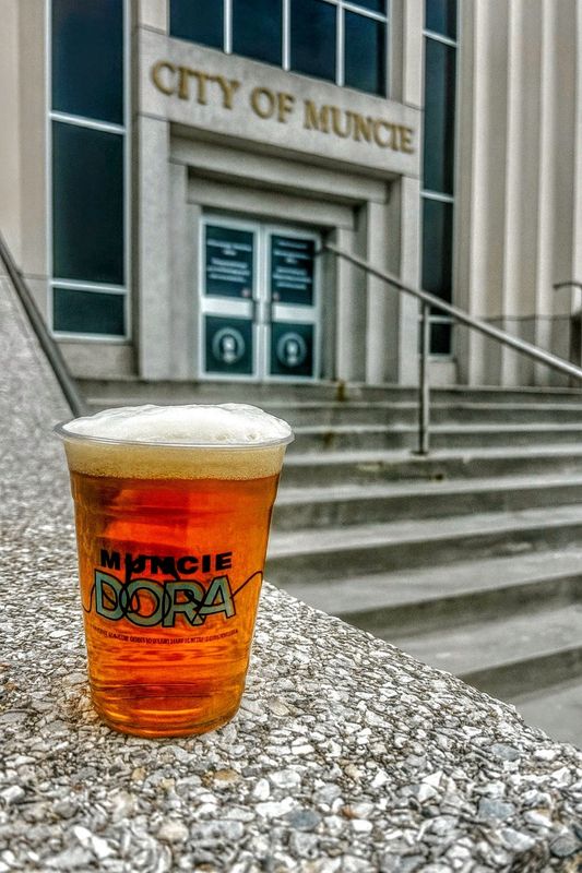 On July 7, the city of Muncie launched three Designated Outdoor Refreshment Areas (DORAs).