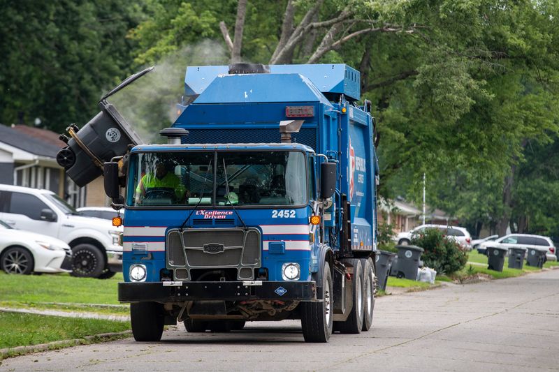 Republic Services collects trash on Kathleen Avenue in Evansville, Ind., Tuesday, July 8, 2025.