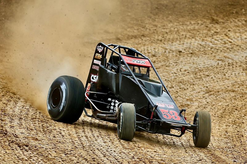 Avon's Brayden Fox slides his No. 53 401 non-winged sprint car through a turn at Bloomington Speedway.