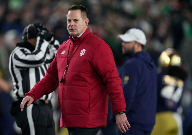 Indiana Hoosiers head coach Curt Cignetti walks the field before a game between the Indiana Hoosiers and the Notre Dame Fighting Irish in first round of the College Football Playoff on Friday, Dec. 20, 2024, in South Bend.
