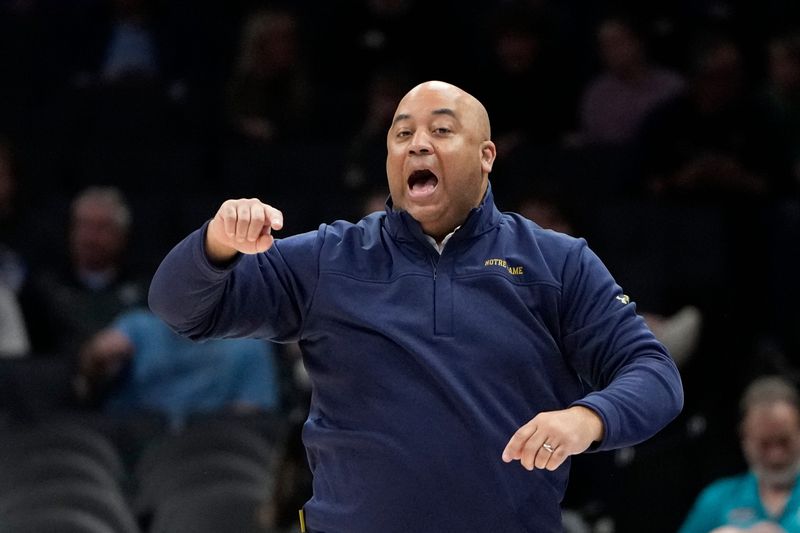 Mar 11, 2025; Charlotte, NC, USA; Notre Dame Fighting Irish head coach Micah Shrewsberry reacts in the first half at Spectrum Center. Mandatory Credit: Bob Donnan-Imagn Images