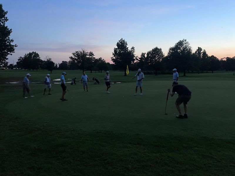 A group of 10 golfers competed for nine spots in a playoff at Fendrich past sunset in the 2025 Evansville Men’s City Tournament qualifier