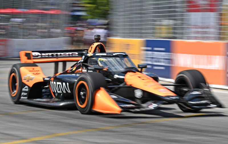 Jul 19, 2025; Toronto, Ontario, Canada; Indycar driver Pato O'Ward (5) during qualifying for the Ontario Honda Dealers Indy Toronto. Mandatory Credit: Dan Hamilton-Imagn Images