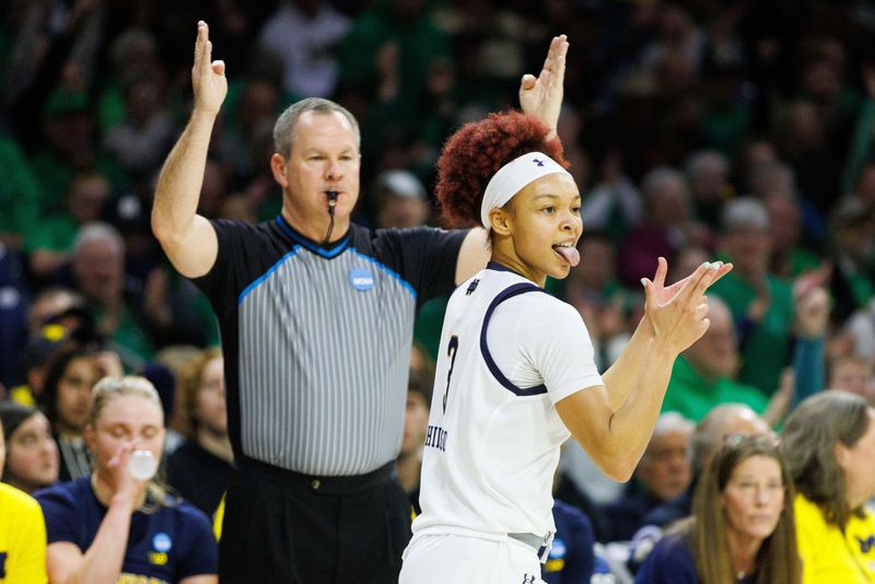 Notre Dame guard Hannah Hidalgo celebrates after making a three point basket during the second round of the NCAA Women's Basketball Tournament between Notre Dame and Michigan at Purcell Pavilion on Sunday, March 23, 2025, in South Bend.