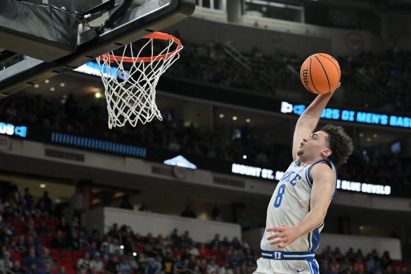 Mar 21, 2025; Raleigh, NC, USA; Duke Blue Devils guard Darren Harris (8) dunks the ball against the Mount St. Mary's Mountaineers during the second half in the first round of the NCAA Tournament at Lenovo Center. Mandatory Credit: Zachary Taft-Imagn Images