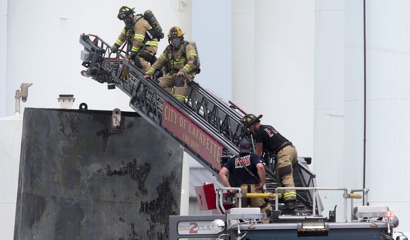 Fire departments respond to a chemical fire inside a tank with toluene Wednesday, July 23, 2025, along Dale Drive and U.S. 52 South in Lafayette, Indiana.