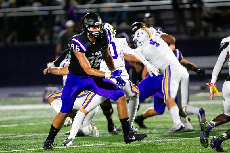 Waukee's Evan Jacobson (86) takes off from the line during a game against Johnston on Friday, Sept. 27, 2024, at Waukee High School.