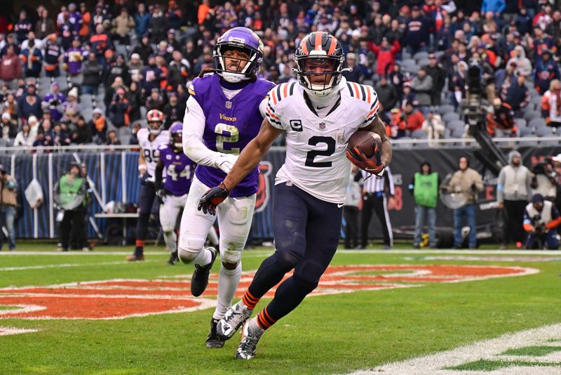 Nov 24, 2024; Chicago, Illinois, USA; Chicago Bears wide receiver DJ Moore (2) makes a reception for a two point conversion against the Minnesota Vikings during the fourth quarter at Soldier Field. Mandatory Credit: Daniel Bartel-Imagn Images