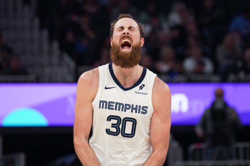 Memphis Grizzlies center Jay Huff (30) celebrates after a three pointer against the Golden State Warriors in the second quarter at Chase Center.
