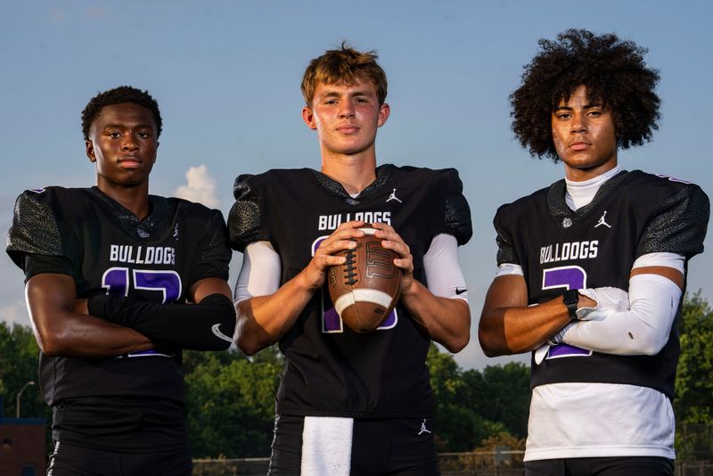 Brownsburg’s Branden Sharpe, Oscar Frye and Avin Robinson pose for a photo Thursday, July 24, 2025, at Decatur Central High School in Indianapolis.