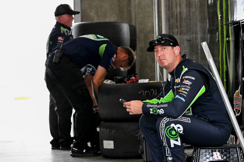 NASCAR Cup Series driver Kyle Busch (8) sits in his garage Friday, July 25, 2025, ahead of practice at Indianapolis Motor Speedway in preparation for the Brickyard 400. Cup practice was cancelled due weather in the area.