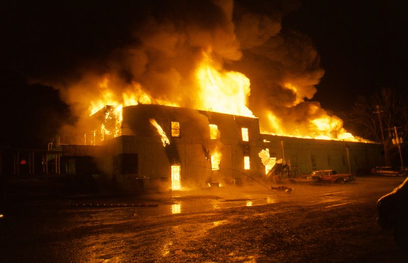 Firefighters battle the historic Club Trocadero fire in early January 1990 in Henderson, Kentucky. Photos by Mike Lawrence.