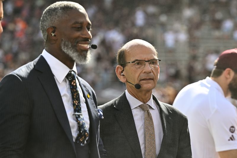 Sep 23, 2023; College Station, Texas, USA; SEC Nation Roman Harper (left) and Paul Finebaum (right) speak on the sideline during pre-game between the Texas A&M Aggies and the Auburn Tigers at Kyle Field. Mandatory Credit: Maria Lysaker-USA TODAY Sports