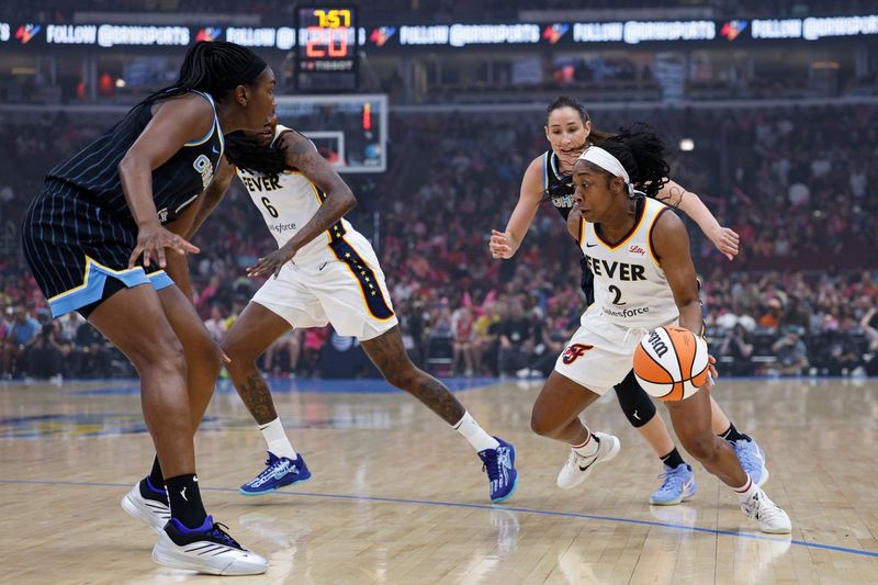 Jul 27, 2025; Chicago, Illinois, USA; Indiana Fever guard Aari McDonald (2) drives to the basket against the Chicago Sky during the first half at United Center. Mandatory Credit: Kamil Krzaczynski-Imagn Images