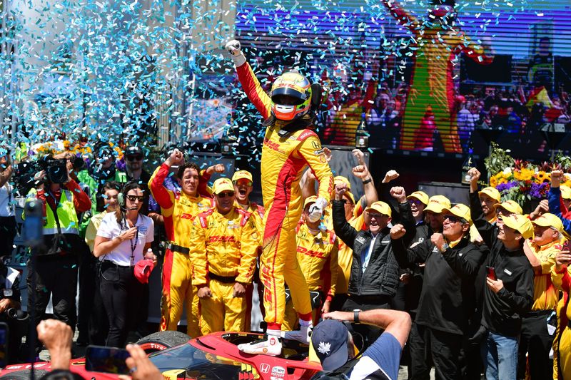 Jul 27, 2025; Salinas, California, USA; Chip Ganassi Racing driver Alex Palou (10) celebrates his victory of the Monterey Grand Prix at WeatherTech Raceway Laguna Seca.