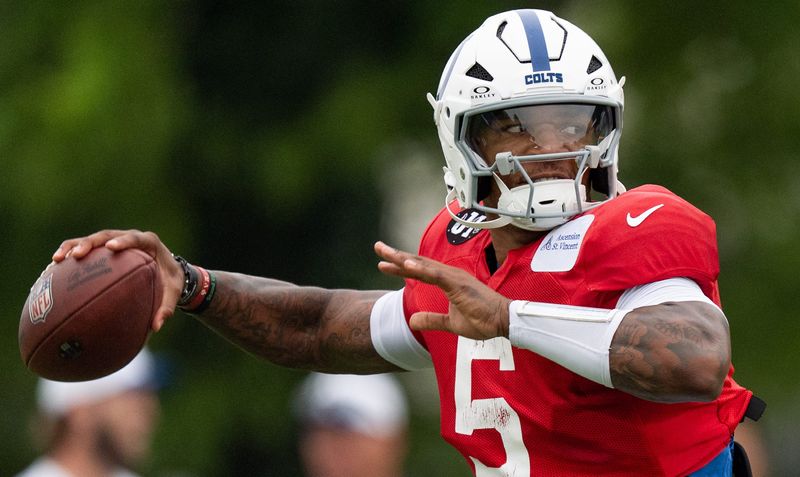 Indianapolis Colts quarterback Anthony Richardson Sr. (5) delivers a pass Monday, July 28, 2025, during training camp held at Grand Park in Westfield.