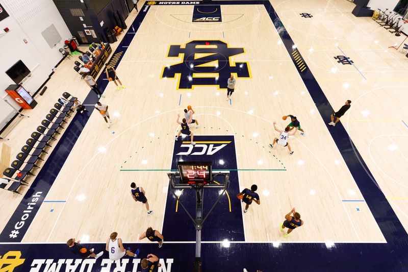 Head coach Micah Shrewsberry, top, leads a Notre Dame men's basketball practice at Rolfs Athletics Hall on Monday, July 28, 2025, in South Bend.