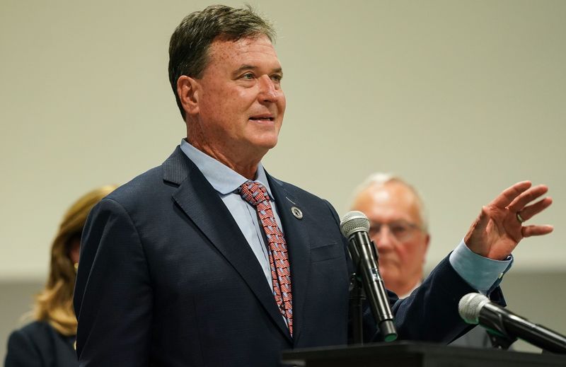 Indiana Attorney General Todd Rokita speaks to a crowd Tuesday, July 29, 2025, during a press conference at Kenworth of Indianapolis.