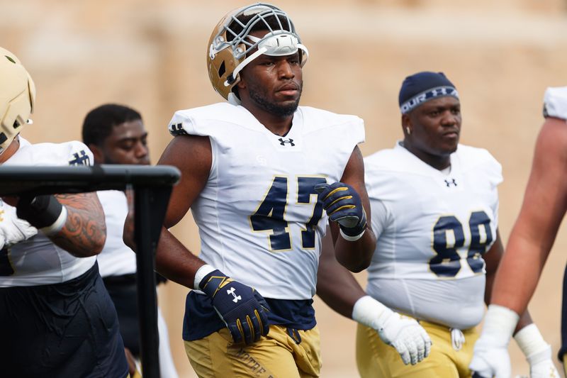 Notre Dame defensive lineman Jason Onye (47) lines up for a drill during a football practice at Irish Athletic Center on Thursday, July 31, 2025, in South Bend.