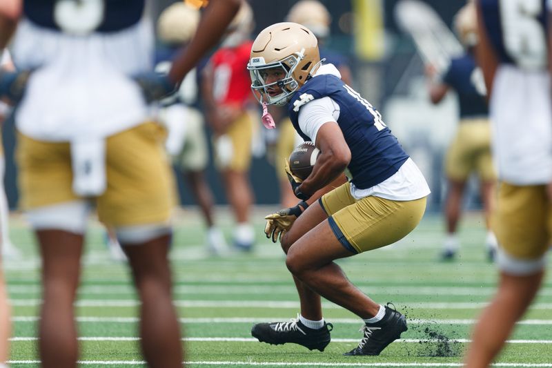 Notre Dame wide receiver Jerome Bettis Jr. runs with the ball during a football practice at Irish Athletic Center on Thursday, July 31, 2025, in South Bend.