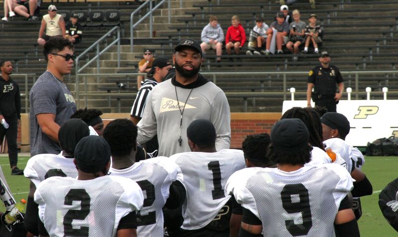 Purdue defensive backs coach Charles Clark talks to the Boilermaker secondary after practice at Ross-Ade Stadium on Saturday, Aug. 2, 2025 in West Lafayette, Indiana.