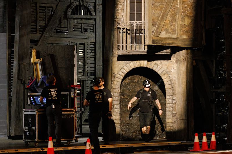 Crew members assemble the set for "Les Misérables" at the Morris Performing Arts Center on Tuesday, Aug. 5, 2025, in South Bend. The show will run from Aug. 5 to Aug. 10.