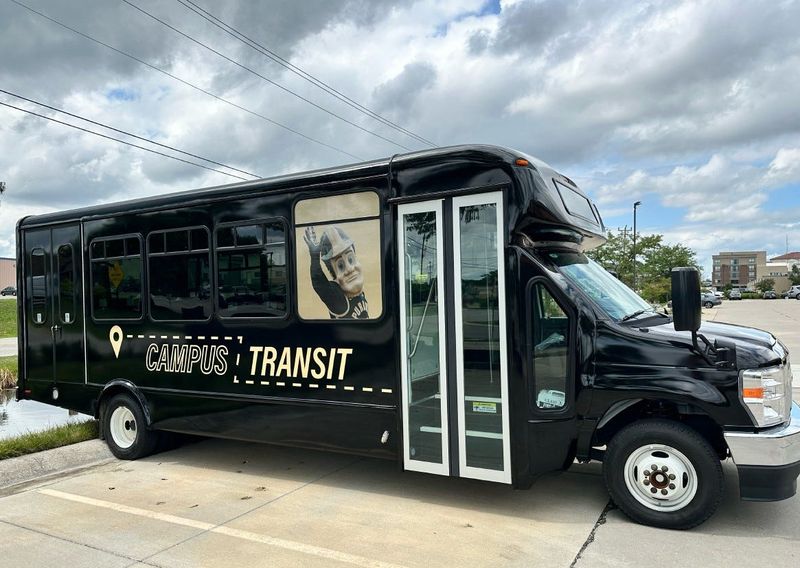 A SP+ shuttle, which will be available on-demand at select pickup and drop-off locations for Purdue affiliates as part of Purdue's new campus transit plan.