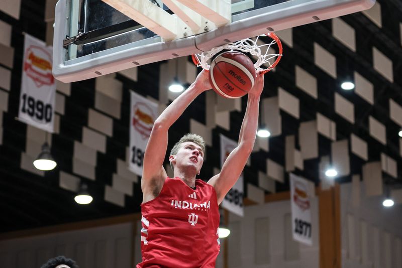 Trent Sisley dunks during Wednesday's game vs. Universidad de Bayamon in Puerto Rico. IU won 98-47.