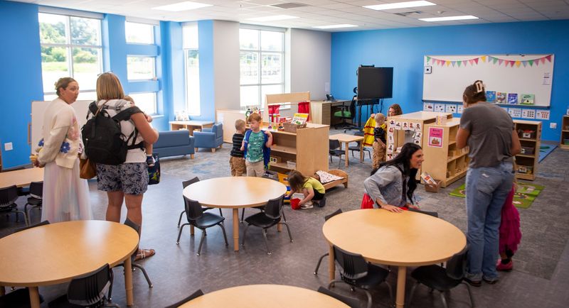 Parents, students, and teachers check out a classroom at Edgewood Early Childhood Center on Thursday, Aug. 7, 2025.