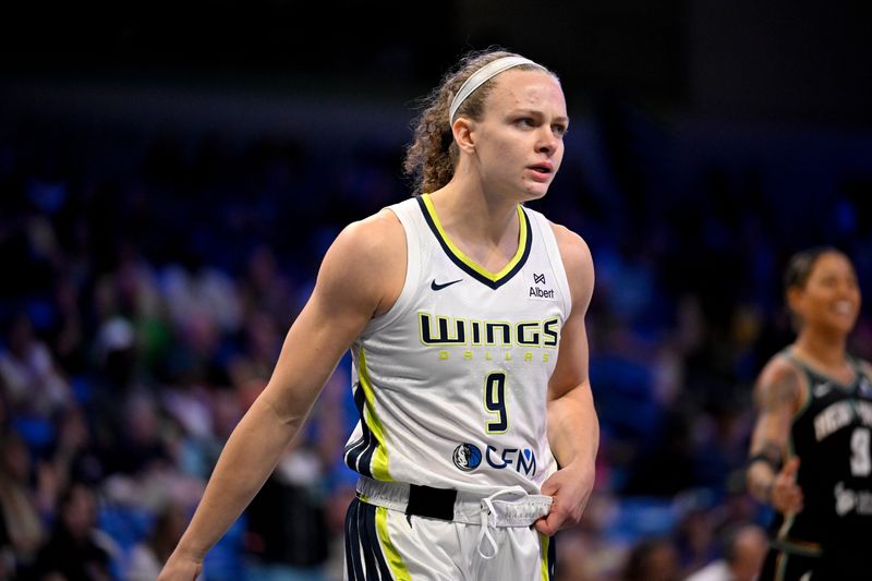 Aug 8, 2025; Arlington, Texas, USA; Dallas Wings guard Grace Berger (9) in action during the game between the Dallas Wings and the New York Liberty at College Park Center.