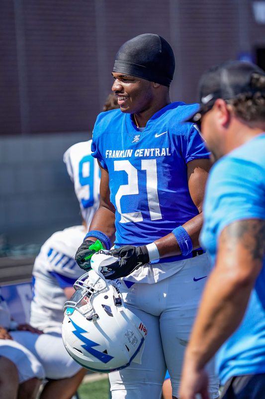 Franklin Central defensive end Jayce Brewer (21) takes part in a scrimmage on Saturday, Aug. 9, 2025, at Franklin Central football stadium in Indianapolis.