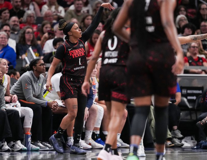Indiana Fever guard Odyssey Sims (1) shoots the ball for a three point basket Tuesday, Aug. 12, 2025, during the game at Gainbridge Fieldhouse in Indianapolis. The Dallas Wings defeated the Indiana Fever, 81-80.