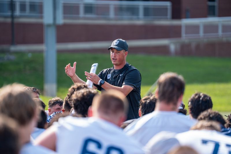 First-year Butler football coach Kevin Lynch addresses his team.