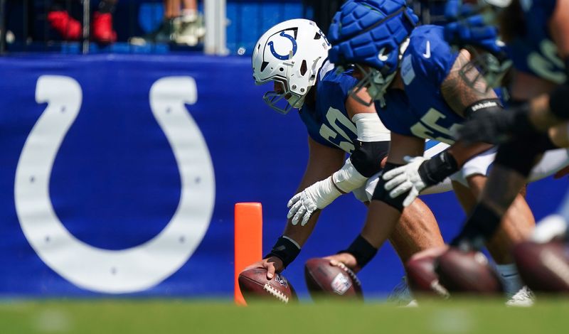 Indianapolis Colts guard Tanor Bortolini (60) practices with teammates on Sunday, Aug. 10, 2025, during Indianapolis Colts Training Camp at Grand Park in Westfield.
