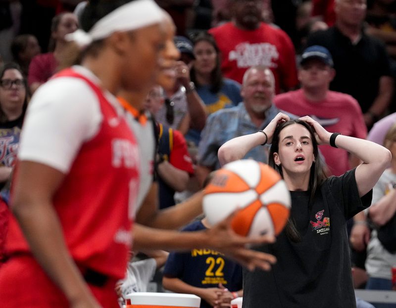 Indiana Fever guard Caitlin Clark (22) reacts during the second half of a game against the Washington Mystics on Friday, Aug. 15, 2025, at Gainbridge Fieldhouse in Indianapolis. The Fever fell to the Mystics 88-84.
