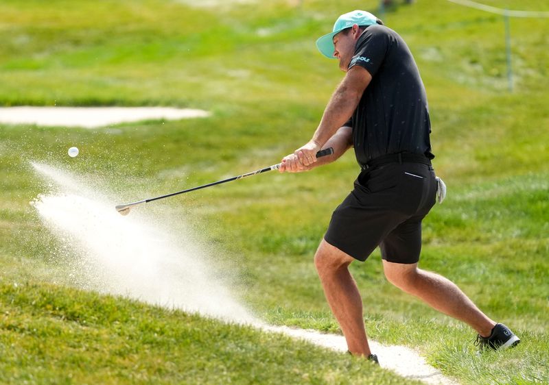 Mito Pereira hits out of a bunker on the 11th hole Saturday, Aug. 16, 2025, during day two of LIV Golf Indianapolis at The Club at Chatham Hills in Westfield.
