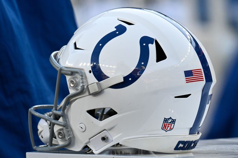 Dec 1, 2024; Foxborough, Massachusetts, USA; An Indianapolis Colts helmet sits on an equipment case during the first half against the New England Patriots at Gillette Stadium. Mandatory Credit: Eric Canha-Imagn Images