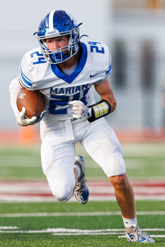 Marian's Vinny Gruber runs the ball up the field during an IHSAA football game between Mishawaka and Marian at Mishawaka High School on Friday, Aug. 22, 2025, in Mishawaka.