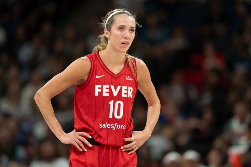 Aug 24, 2025; Minneapolis, Minnesota, USA; Indiana Fever guard Lexie Hull (10) looks on against the Minnesota Lynx in the second half at Target Center. Mandatory Credit: Jesse Johnson-Imagn Images
