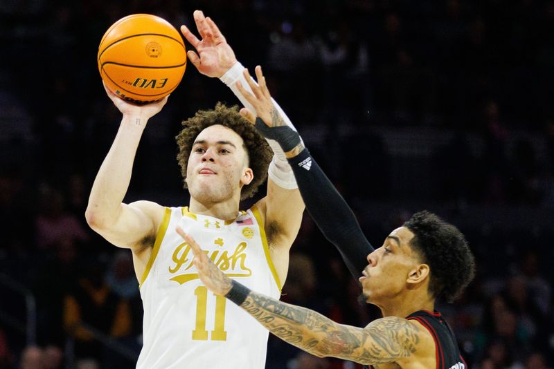 Notre Dame guard Braeden Shrewsberry (11) shoots the ball during a NCAA men's basketball game between Notre Dame and Louisville at Purcell Pavilion on Sunday, Feb. 16, 2025, in South Bend.