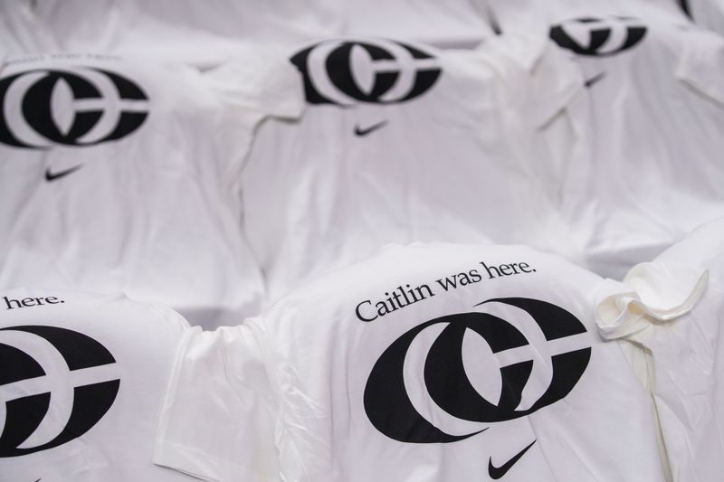 Indiana Fever guard Caitlin Clark (22) T-shirts line the arena Tuesday, Aug. 26, 2025, before a game between the Indiana Fever and the Seattle Storm at Gainbridge Fieldhouse in Indianapolis.