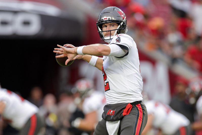 Tampa Bay Buccaneers quarterback Kyle Trask warms up before a game against the Buffalo Bills.