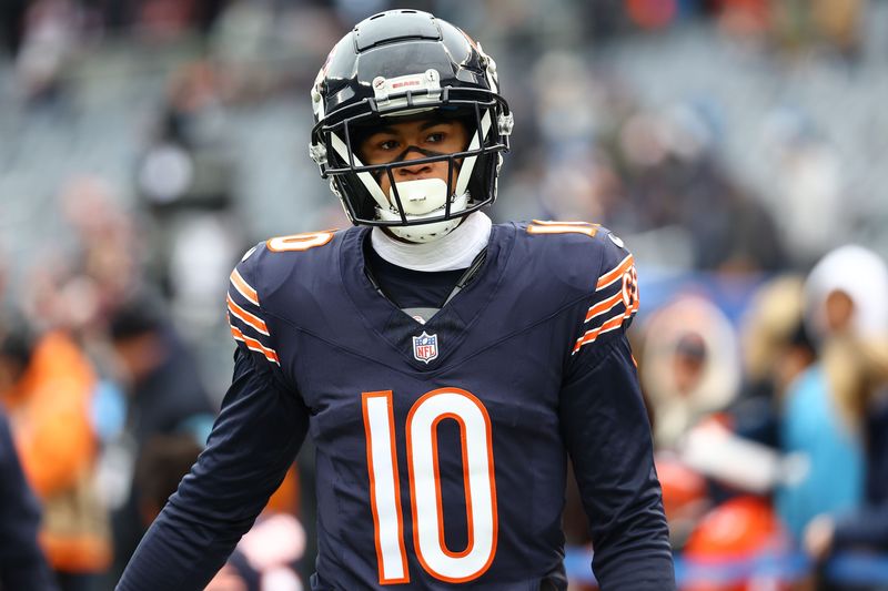 Dec 22, 2024; Chicago, Illinois, USA; Chicago Bears wide receiver Tyler Scott (10) practices before the game against the Detroit Lions at Soldier Field. Mandatory Credit: Mike Dinovo-Imagn Images