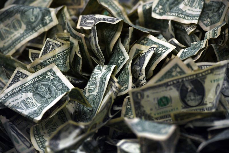 A pile of dollar bills.