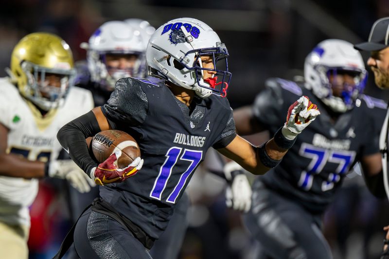 Brownsburg High School junior Chancelor Adams (17) runs an interception up field during the second half of an IHSAA varsity football game against Indianapolis Cathedral High School, Friday, Aug. 29, 2025, at Brownsburg High School.